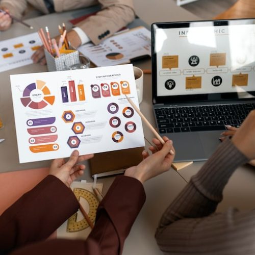 high-angle-people-working-with-laptop_23-2149636255